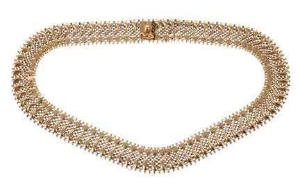 Collar elaborado
De mediados del siglo XX, oro ama