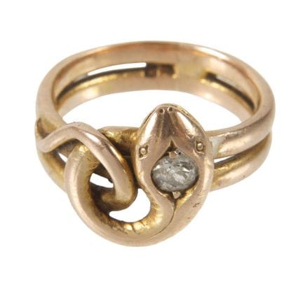 Anillo de serpiente con diamante
Principios del si