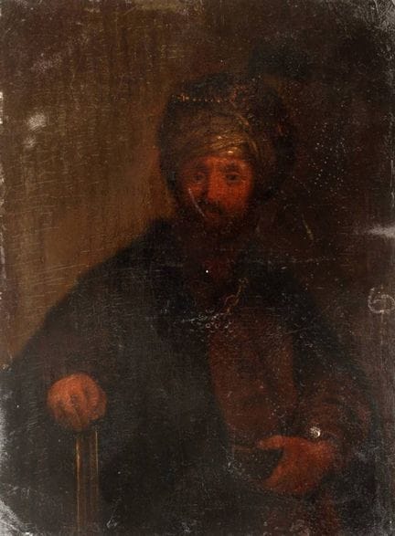 Uomo in abiti orientali
Signore barbuto e riccamen