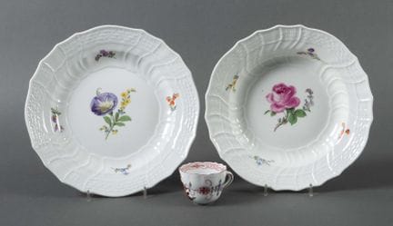 Two plates and a mocha cup, Meissen, 19th century.