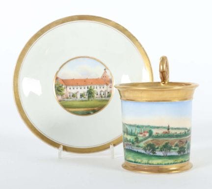 Scenic cup with saucer, German, 19th century. Porc