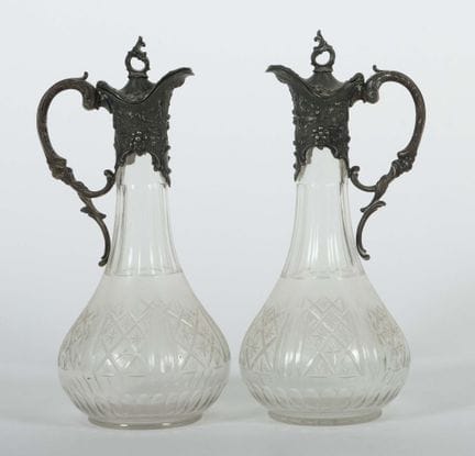 Pair of carafes, circa 1900. Colorless, faceted gl