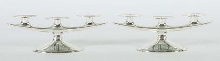 Pair of three-candle candlesticks by Wilkens &amp;