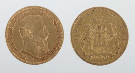 两枚德国20马克金币，铸造年份分别为 1878年和1888年，金质900，约15.86克，分别印有“