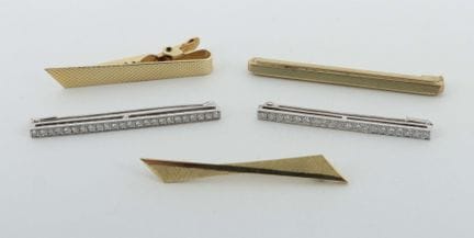 5 broches en forme de tige, XXe siècle, lot de 5 b