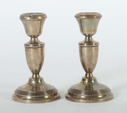 Pair of single-flame candlesticks by Joseph Gloste
