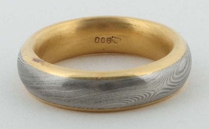 J. Brodmerkel 戒指，20/21世纪，900黄金与（据推测）钢制戒指，带有Jule Br