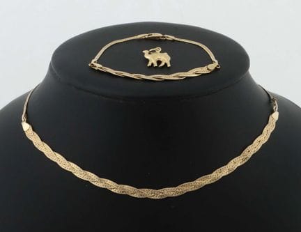 Lot de 3 bijoux en or du XXe siècle, composé de : 