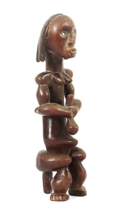 Figurine féminine aux yeux en miroir, Gabon, entre