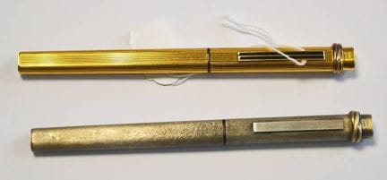 Cartier
Two fountain pens in silver plated metal w