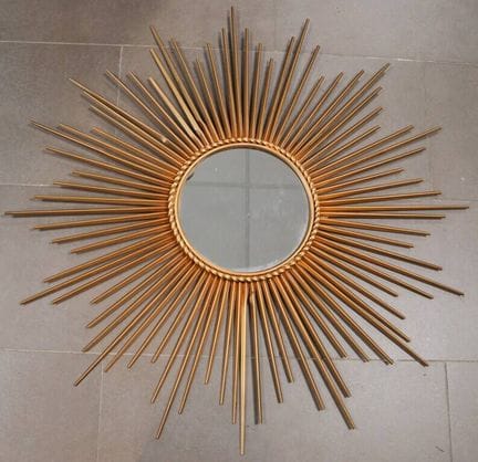 CHATY, VALLAURIS
Espejo «sol» de metal dorado, fir