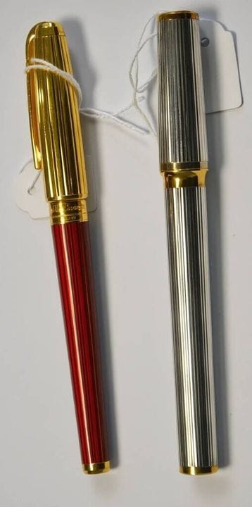 DUPONT
2 fountain pens, one in ribbed silver plate