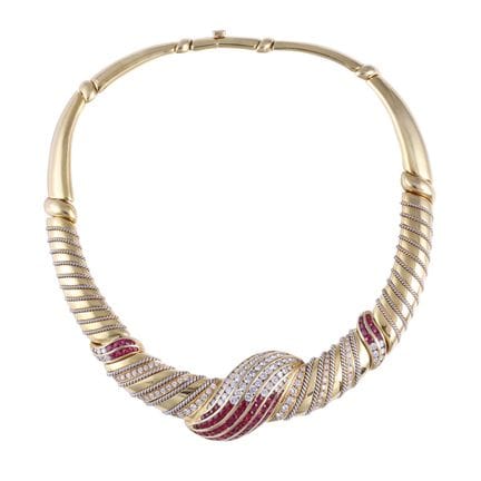 COLLAR SEMIRÍGIDO, realizado en oro amarillo y bla