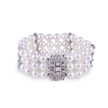 BRACELET composé de trois rangées de perles de cul