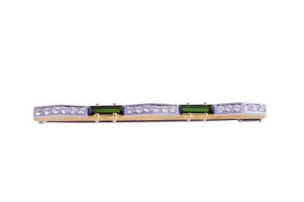 BROOCH, POMELLATO bar-style, in 18K yellow and whi