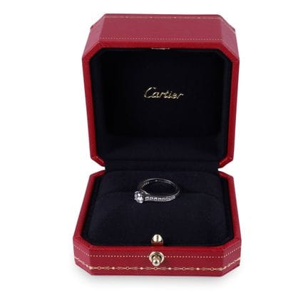 ANILLO CARTIER de platino con un brillante central