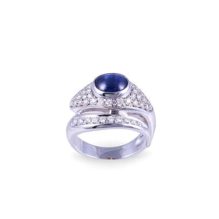 * BAGUE en or blanc 18 carats en forme de serpent,