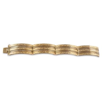 BRACELET en or jaune 18 carats, composé de quatre 