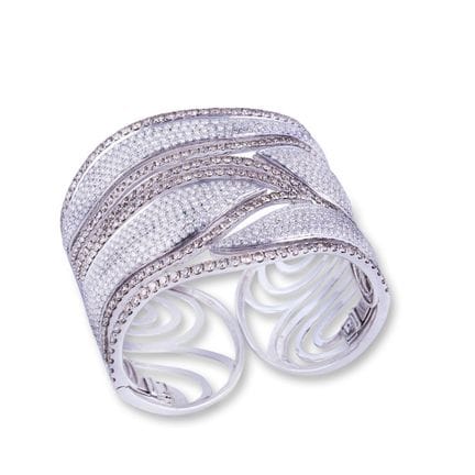 * PULSERA rígida, de oro blanco de 18 quilates, co