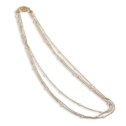 COLLIER en or jaune 18 carats composé de trois cha