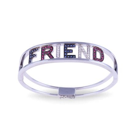 * Rigid bracelet in 18K white gold, featuring the 