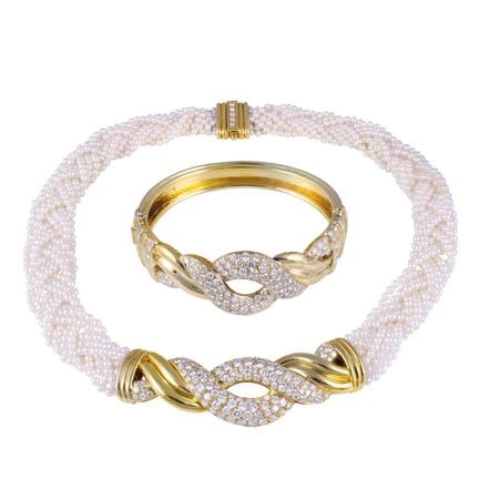 CONJUNTO de oro amarillo de 18 quilates, compuesto