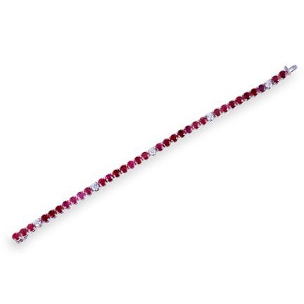 * BRACCIALE rivière in oro bianco 18Kt con rubini 