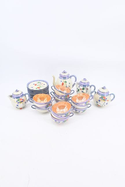 Juego de vajilla de porcelana con decoración polic