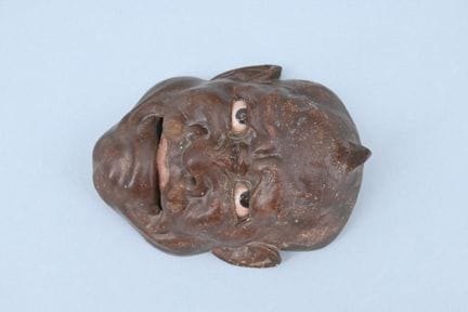 Máscara de madera tallada del tipo Ikkaku Sennin. 