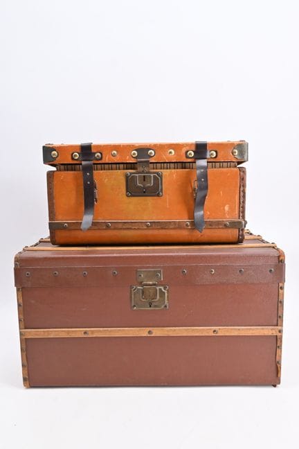 Two fashion doll travel trunks, with flat lids and