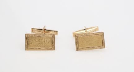 A pair of 14k gold cufflinks. Stamped 585 and with