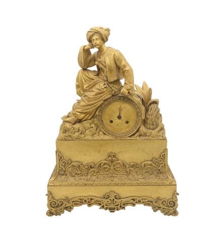 A French Philhellenic gilt-bronze mantel clock dep