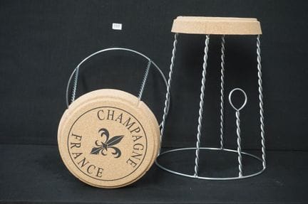 2 decorative benches—shaped like giant champagne c