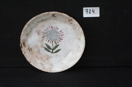 CERAMIQUE DOUR - glazed plate decorated with a flo