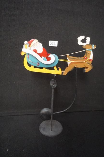metal swinging statue—decorated with Santa Claus—H