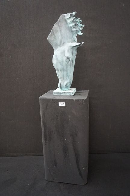 Beautiful bronze horse head on a black pedestal - 