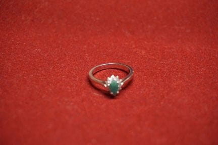 Beautiful classic ring—featuring 1 emerald weighin
