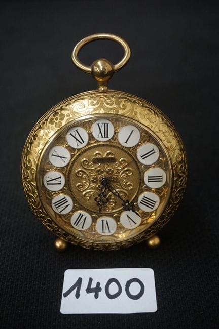 Reloj de mesa vintage de bronce —con forma de relo