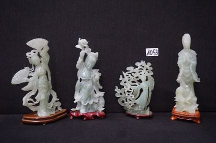 4 assorted Chinese jadeite sculptures—on wooden ba