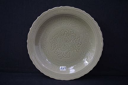 Large Chinese plate in celadon—decorated with flor