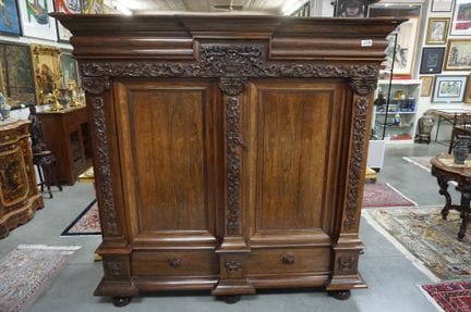 Beautiful antique Dutch scroll-carved cabinet—rose