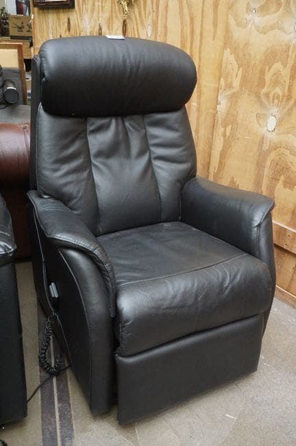 Black leather recliner — with electric controls — 