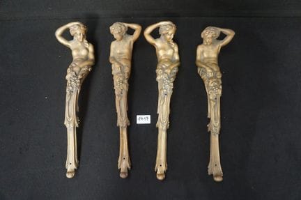 4 large bronze ornaments—in the shape of 2 men and