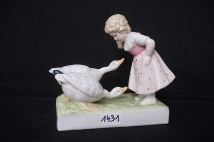 Polychrome porcelain sculpture - "Girl with Two Ge
