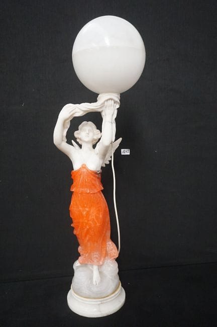 Large decorative alabaster lamp—ca. 1930—held by a
