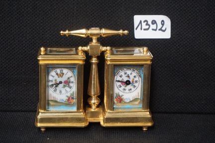青铜双层“CARRIAGE CLOCK”——饰有花卉图案的瓷质饰板——高：10 厘米