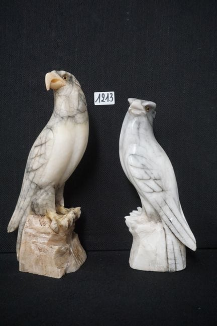 2 birds of prey in albatross - ca. 1920 - 1 with a