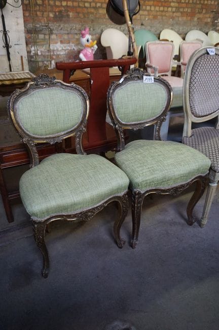 2 antique gilded chairs in the Rococo style