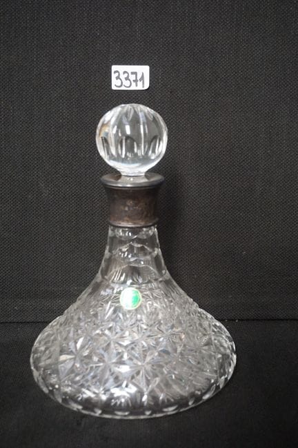 Captain's carafe, cut crystal with silver mounts -