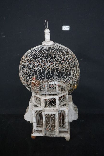 vintage birdcage made of wood and iron